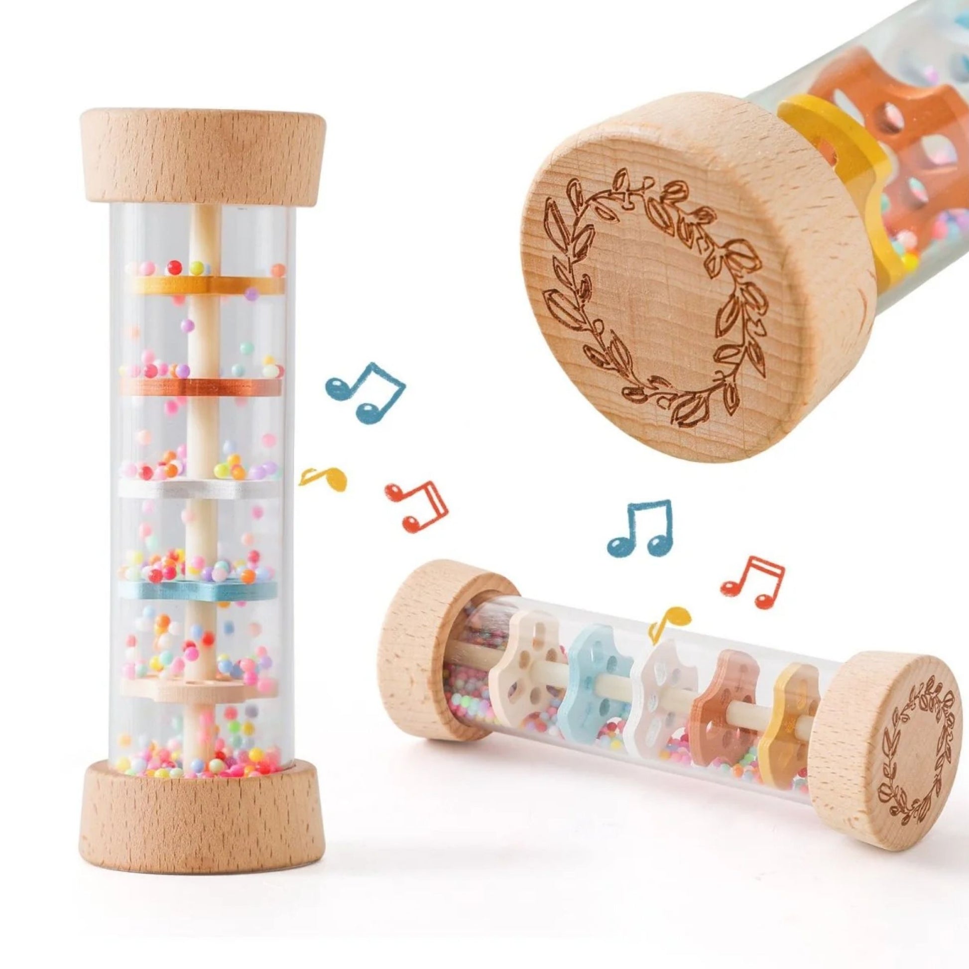 Wooden Montessori rainmaker rattle with colorful beads and leaf-engraved natural wood caps.