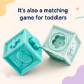 Two mint Montessori squeaky building blocks with matching raised shapes for a toddler matching game.